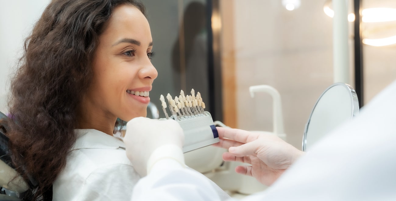 Woman smiling at dental appointment in Salt Lake City UT