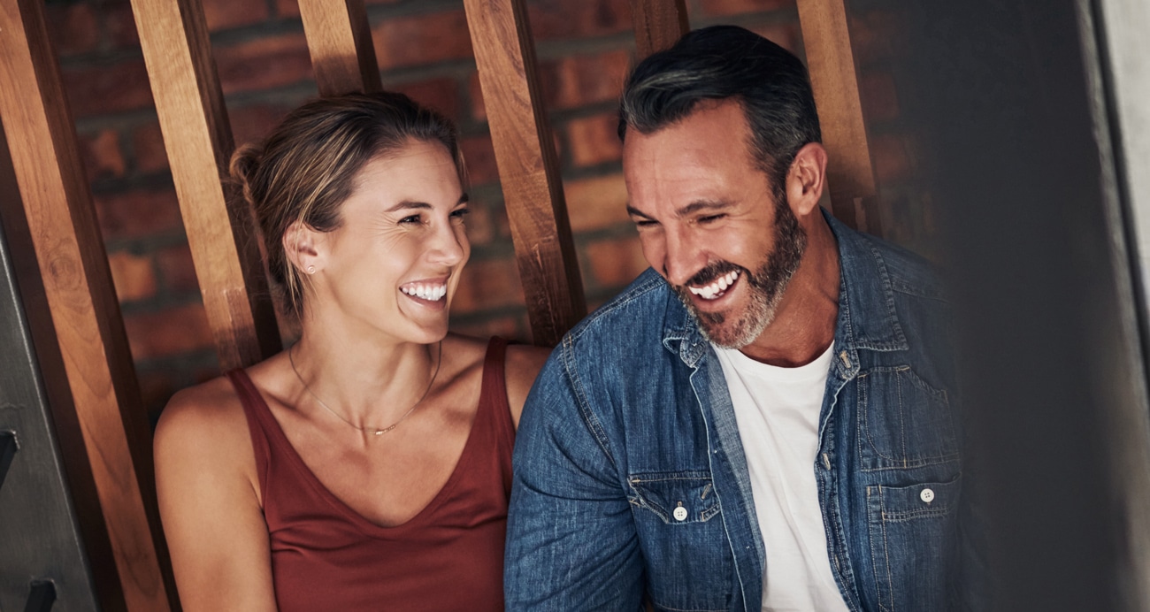 Woman and man smiling after dental care in Salt Lake City UT