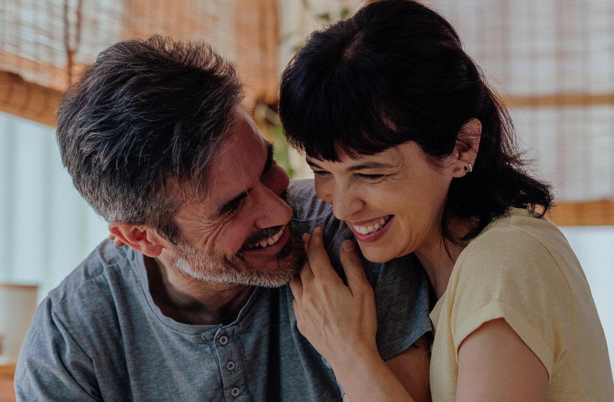 Man and woman hugging and smiling after dental care in Salt Lake City UT