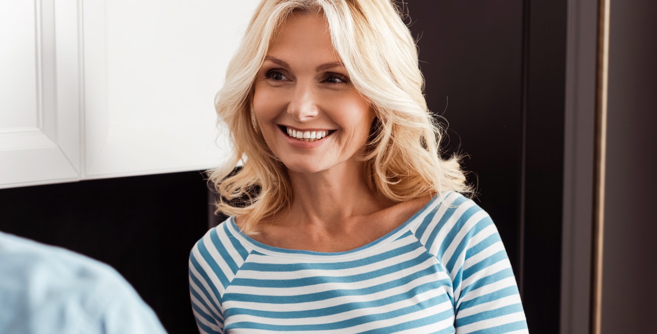 Woman smiling after dental care in Salt Lake City UT