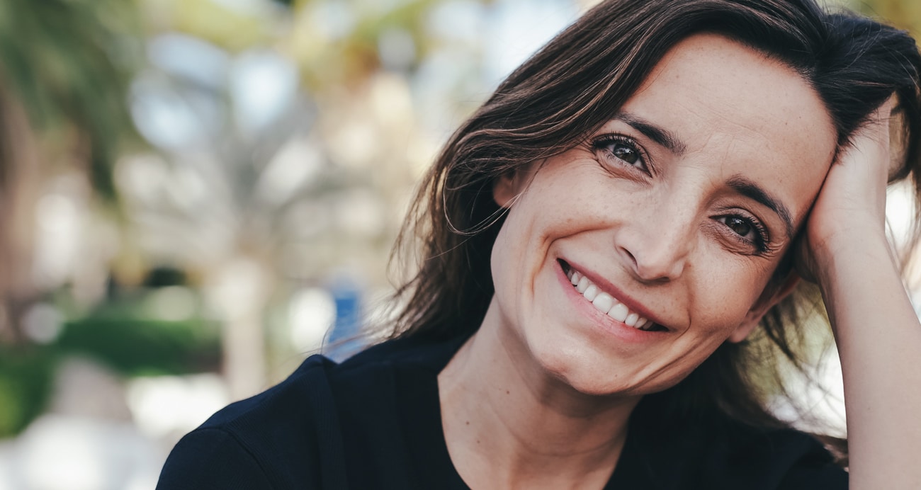 Woman smiling after dental care in Salt Lake City UT