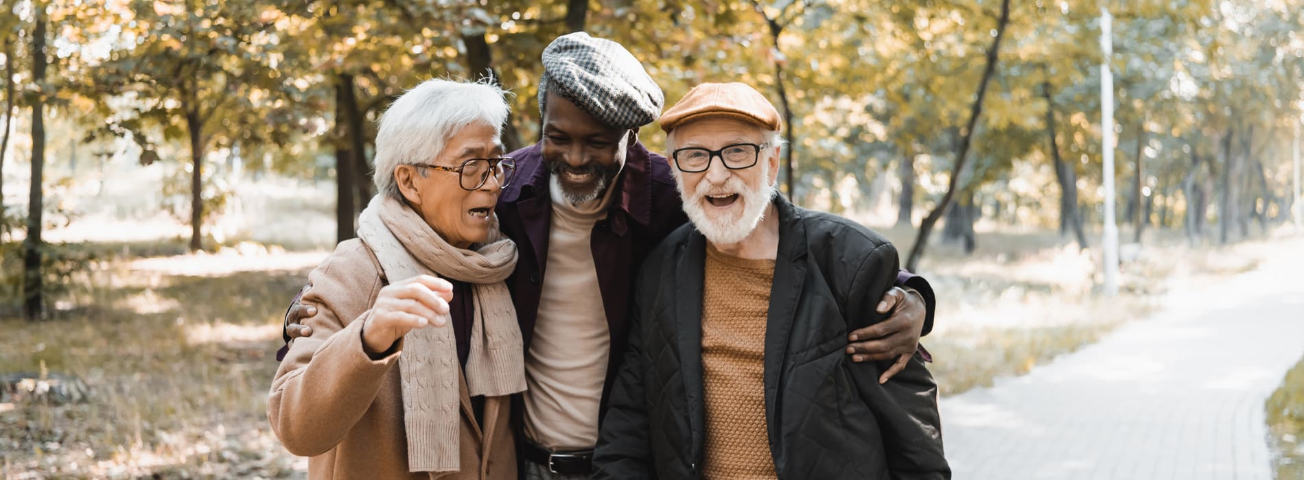 AdobeStock_461033213 v3 Men smiling and walking from their Prosthodontic Consultation in SLC UT