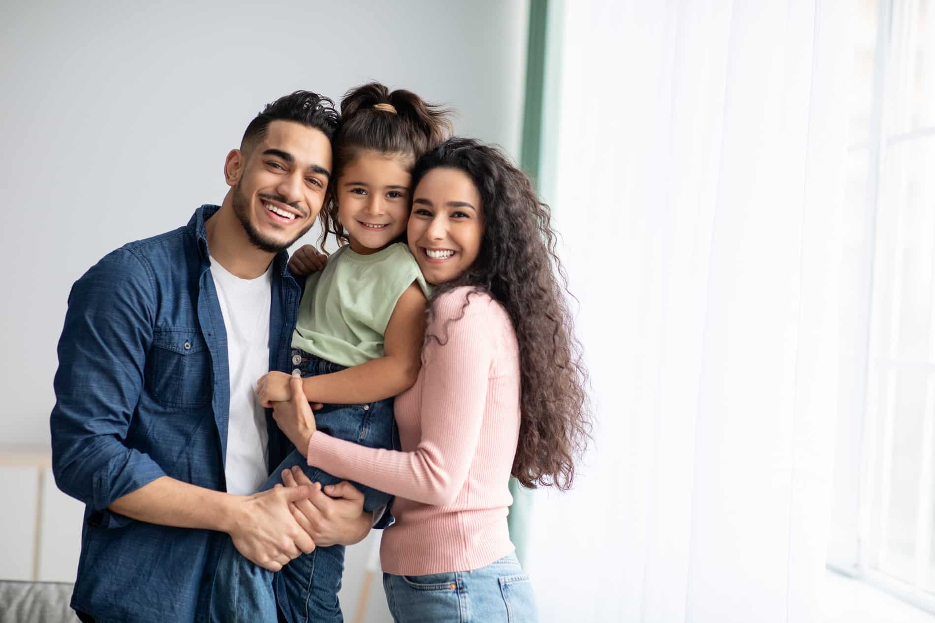 AdobeStock_420249849 v2 Family happy with their teeth in a day solutions in Salt Lake