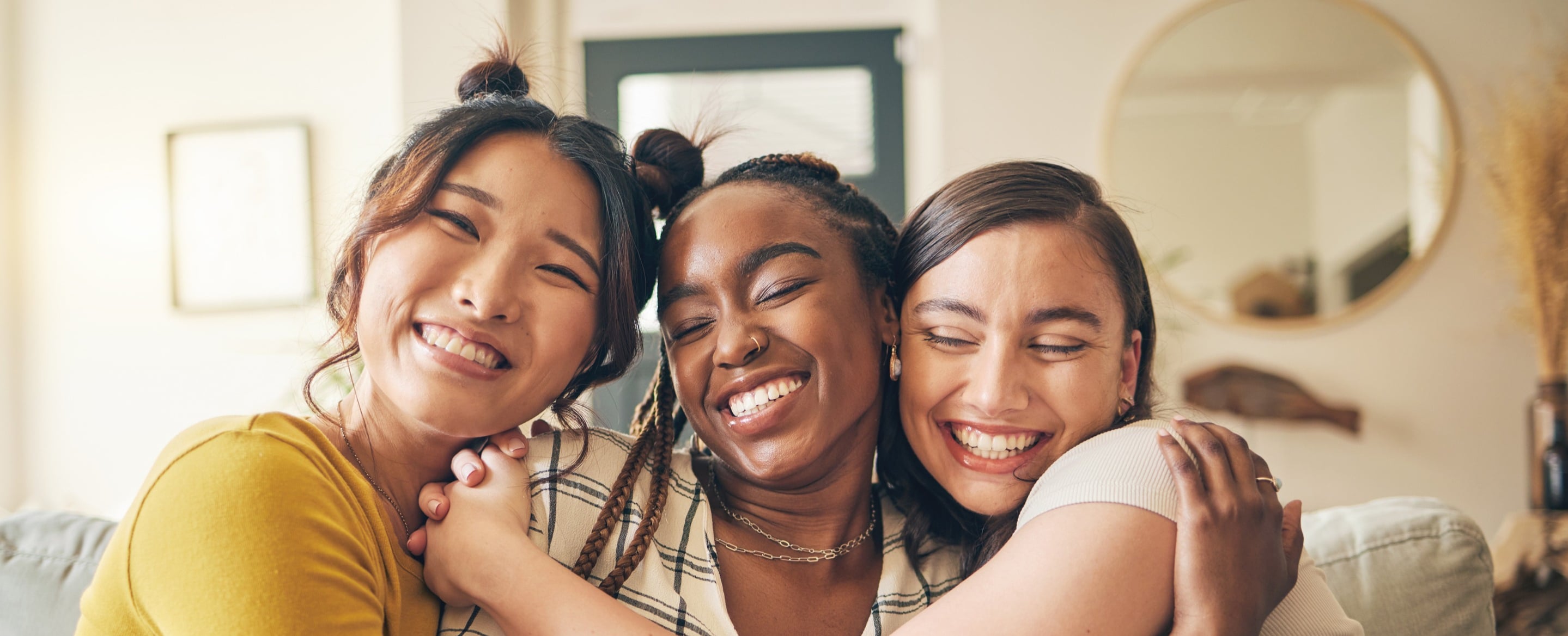 Girls hug eachother well rested because of a sleep device from the dentist in SLC UT
